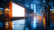 © Siasart Stock - Urban night scene with a blank billboard and reflective wet streets.