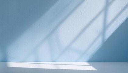 Wall Mural - empty room minimalistic light blue background for product presentation with shadow and light from wi