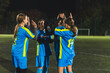 © PoppyPix - girls power and victory, teenage football player girls clapping and getting ready to play. High quality photo