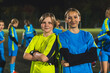 © PoppyPix - young goalkeeper and football player girls taking a photo, teamwork and girls soccer. High quality photo