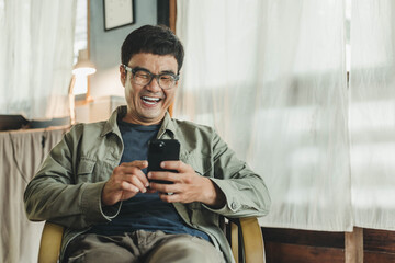 man using cell phone holding mobile texting message contact us.chatting,search internet shopping online.technology device communication connecting