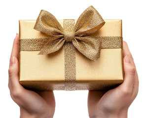 Wall Mural - Wrapped gift box with golden ribbon held by hands isolated on white background. PNG transparent.