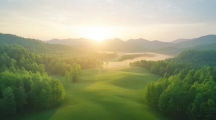 Wall Mural - a beautiful landscape with a large green field