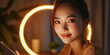 © dinastya - Asian young beautiful woman blogging in front of a ring lamp. Beauty blogger, Influencer, working from home