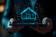 © Earny - A person holding a tablet displaying a glowing digital house icon, representing technology, innovation, and smart home concepts.