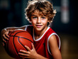 © Llama-World-studio - Happy young basketball player in a school environment