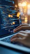 © Exnoi - A close-up of hands typing on a laptop with a coding interface, representing technology and innovation