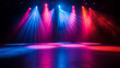 © Best_Seller - An empty stage illuminated by colorful spotlights, showcasing various scene lighting effects. The setup emphasizes the vibrant and dynamic potential of the stage, ideal for performances, presentation