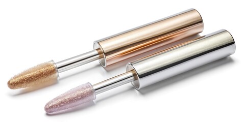 two metallic lip gloss applicators with soft, fuzzy wands and transparent tubes sit side by side on 