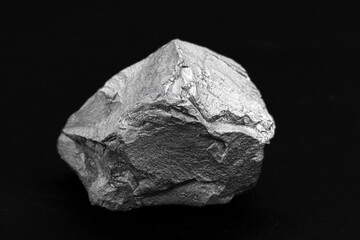 Poster - Iron ore on isolated black background, metal used in metallurgic