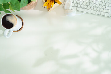 Wall Mural - Working desk with diary, keyboard, coffee cup. Top view with copy space for your text.