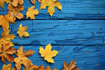 Wall Mural - Autumn background with yellow maple leaves on a blue wooden table, in a top view. Space for text. Autumn concept. AI colorization of autumn leaves. Background for design and photo effects.