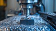 © Thanaporn - CNC milling machine creating a complex part from a metal lock, focusing on precision and efficiency in production.