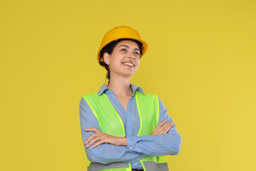 Wall Mural - Engineer in hard hat on yellow background