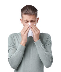 Poster - Young man with tissue suffering from sinusitis on white background