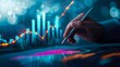 © Kakabe - A hand holding a pen hovers over a digital chart with graphs and data visualizations, making it suitable for concepts related to finance, analysis, stock market, or business growth,