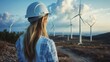 © Jayk - Young female engineer checking wind turbines