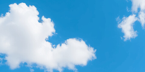 Wall Mural - Natural and cloudy fresh blue sky background. Natural sky beautiful blue and white texture background. blue sky with cloud. sky with white clouds as background or texture	