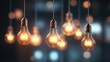 © MakoPoko - Light bulbs hanging from thin cords, representing bright ideas, creativity, and innovation in a simple yet elegant conceptual design.