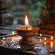 © pier - eternal light from a polished gold lamp at diwali
