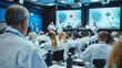 © Swaroop - A large, modern conference room filled with healthcare professionals attending a seminar. The focus is on a presenter explaining a complex medical topic.