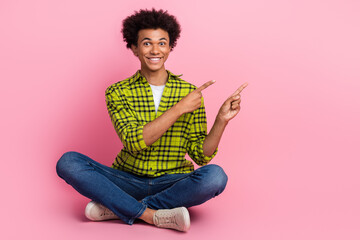 Poster - Full length portrait of nice young man indicate fingers empty space wear shirt isolated on pink color background