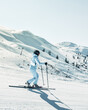© Evaldas - Close up woman skier practice enjoy skiing on cross-country skis train on winter ski resort on sunny fresh snow day outdoors with beautiful caucasus landscape