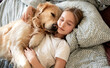 © Ievgen Skrypko - Cute Little Girl Sleeping With Golden Retriever Dog In Embrace In Bed