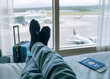 © kieferpix - Traveler on a stopover relaxing resting at hotel room, travel concept