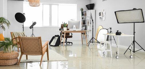 Poster - Interior of modern studio with photographer's workplace and equipment