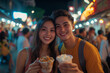 © Dzmitry - A joyful Asian couple captures their adventure while enjoying street food at a vibrant night market in a bustling city