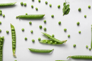 Wall Mural - Green peas on light background