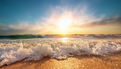 Wall Mural - a tight shot of a wave crashing on the sandy shore sun glowing overhead in the sky above the water