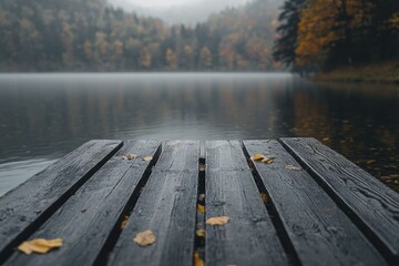 Sticker - A tranquil and charming scene featuring a weathered wooden pier extending into a peaceful lake, embraced by vibrant autumn leaves.