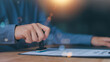 © chaylek - The concept of confirmation of a contract document or a warranty card ,Business Agreements and Approvals ,business contract signing ,Approval of checklist documents ,stamping in the contract