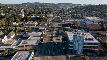 Wall Mural - Los Angeles, California, USA - August 18, 2024: Late afternoon sunlight shines on the historic downtown Eagle Rock historic core.