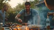 © LL - Handsome male preparing barbecue