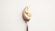 © Nattawaw bbt - mayonnaise on a white background. The focus is on the sauce’s creamy texture and appearance