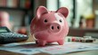 © keks20034 - A pink piggy bank on the background of financial charts and a calculator symbolizes financial management