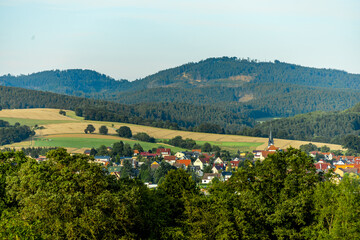 Wall Mural - Unterwegs an einen spätsommerlichen Tal mit Blick in das wunderschöne Werratal bei Breitungen - Thüringen - Deutschland