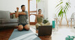 © PeakPoints/peopleimages.com - Man, woman and stretching with laptop, online class and warm up for exercise and muscle training at home. Workout, internet video and couple with sports, wellness and technology for health guide