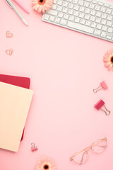 Wall Mural - Flat lay modern workspace with office supplies on pink background. Banner design for themes related to education, organization, and creative workspaces