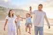 © Lumeez23/peopleimages.com - Beach, father and mom with child for swing, playful and bonding together on vacation in California. Family, dad and mother with girl for walking, game and connection with happy daughter on adventure