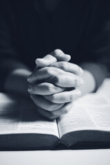 Poster - A young woman, hands clasped in prayer, meditates on her faith, seeking guidance from God and Jesus Christ in a moment of deep religious devotion. person, woman, faith, pray, prayer, hand, religion.