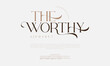 © fourmonths - The worthy swash luxury elegant alphabet letters and numbers. Vintage wedding typography classic serif font decorative vintage retro. creative vector illustration