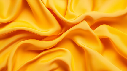 Bright yellow and orange fabric with warm folds and gentle curves abstract background for National Immunization Day uplifting and encouraging energy 