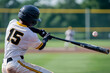 © Phichitpon - Baseball player hitting ball with bat a bat powerfully towards an on coming baseball.