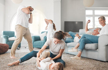 Sticker - Family, children and playing on floor in living room for funny games, love and support on weekend. Happy, mother and father bonding with kids on carpet at home for humor, joke and laughing together