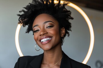 Sticker - Joyful African American woman standing in front of a circular light representing the warmth and positivity of creative ideas in a modern workspace