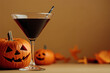 © Andrii Fanta - Black Magic martini cocktail, Halloween background